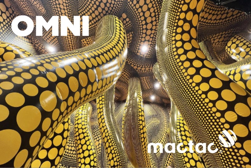 Inside part of an art installation using Mactac WW300 and JT 8700 self-adhesive print films that uses a beautiful and inspiring yellow and black dot pattern design applied on all on floors, walls, columns and ceiling surfaces!